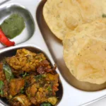 Achari Aloo Gobi with Ajwain Poori